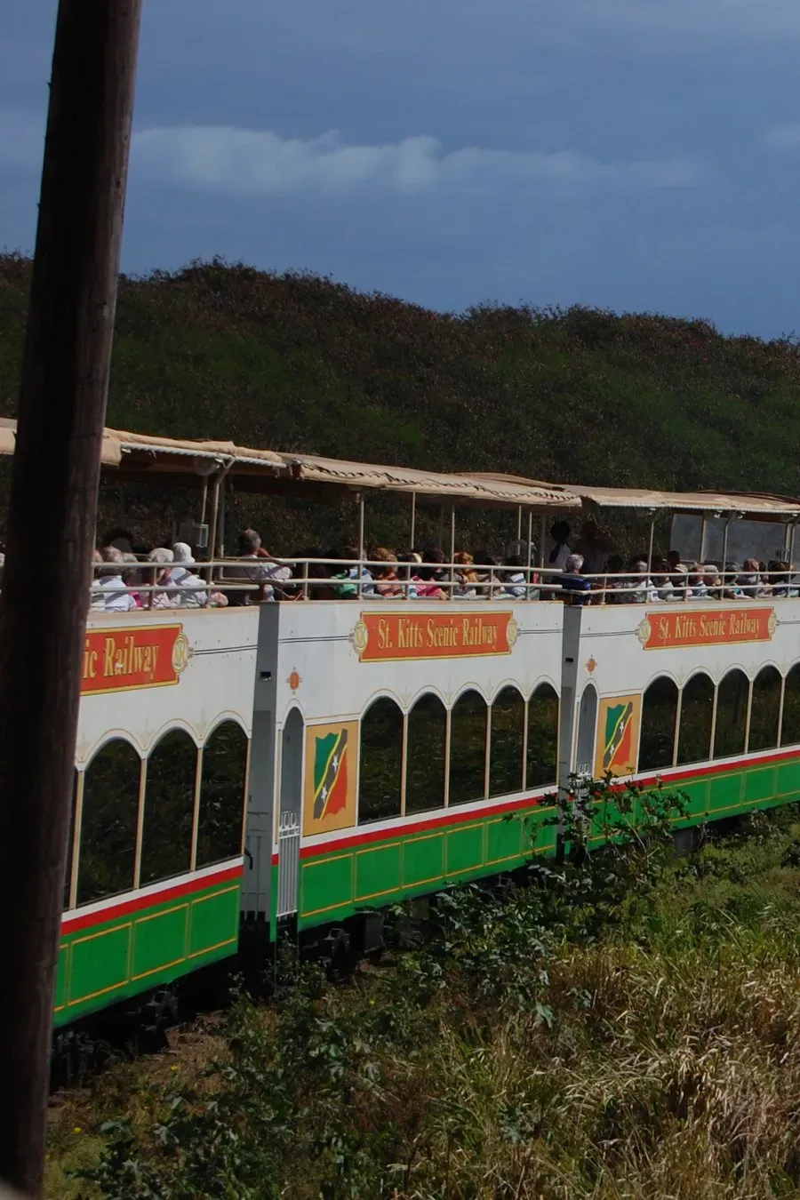 Guests riding the open-air tour truck through St Kitts